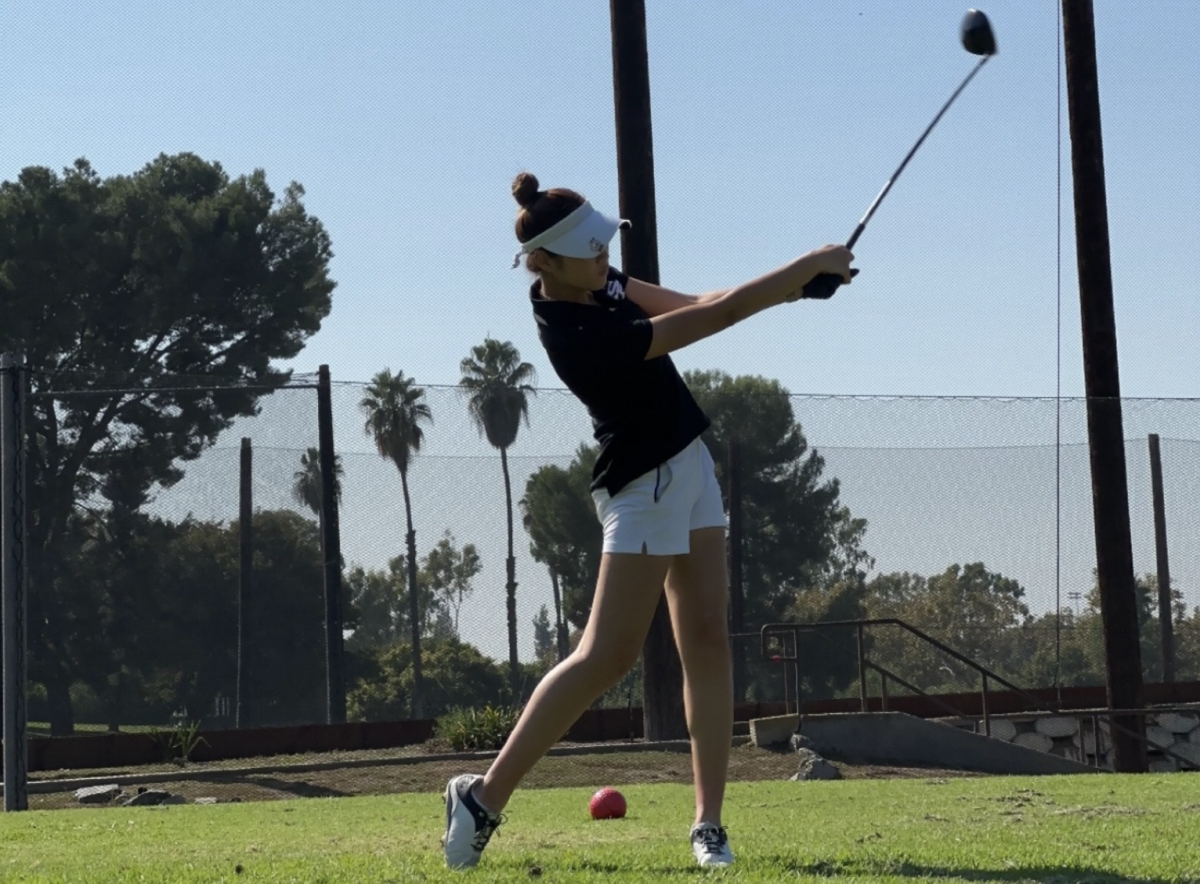 Junior Angelina Jeong tees off on the first hole at La Mirada Golf Course on Tuesday, Sept. 26, during a Freeway League match against Troy High School.